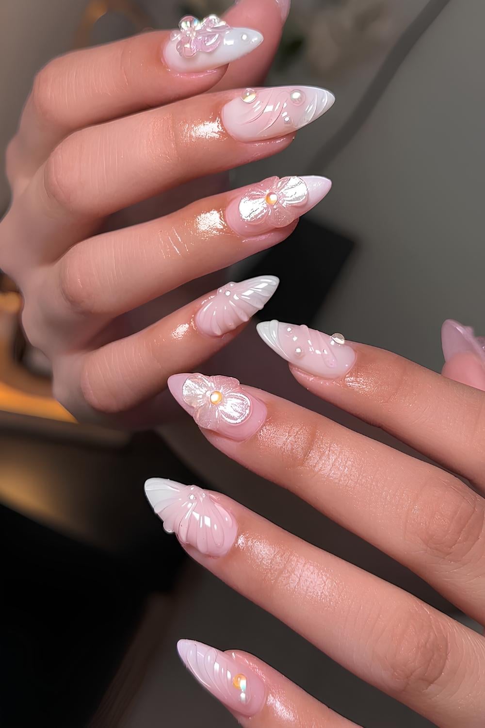 White ombre nails with pearls and shell art