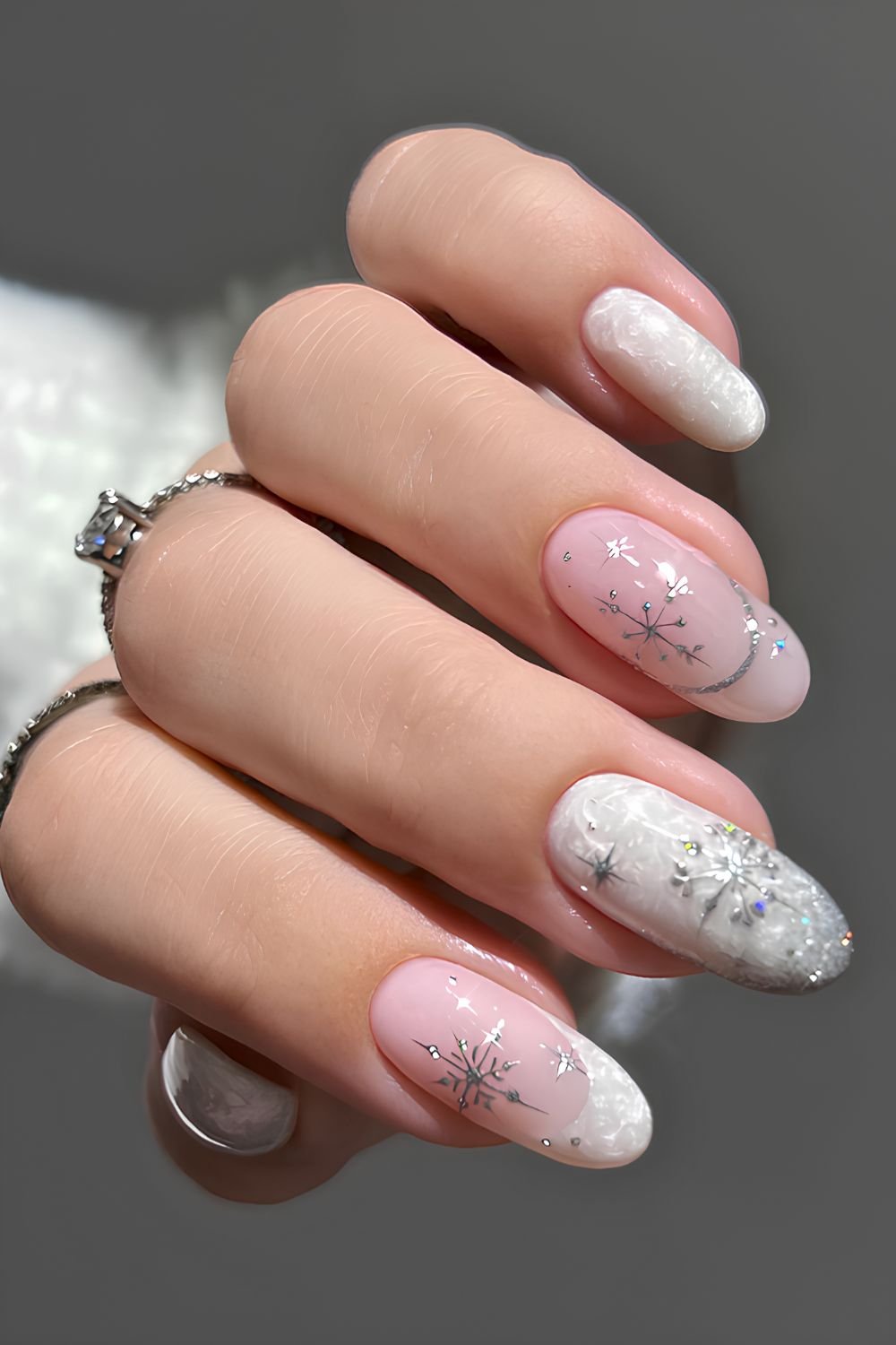 White pearl swirl nails with silver Christmas art