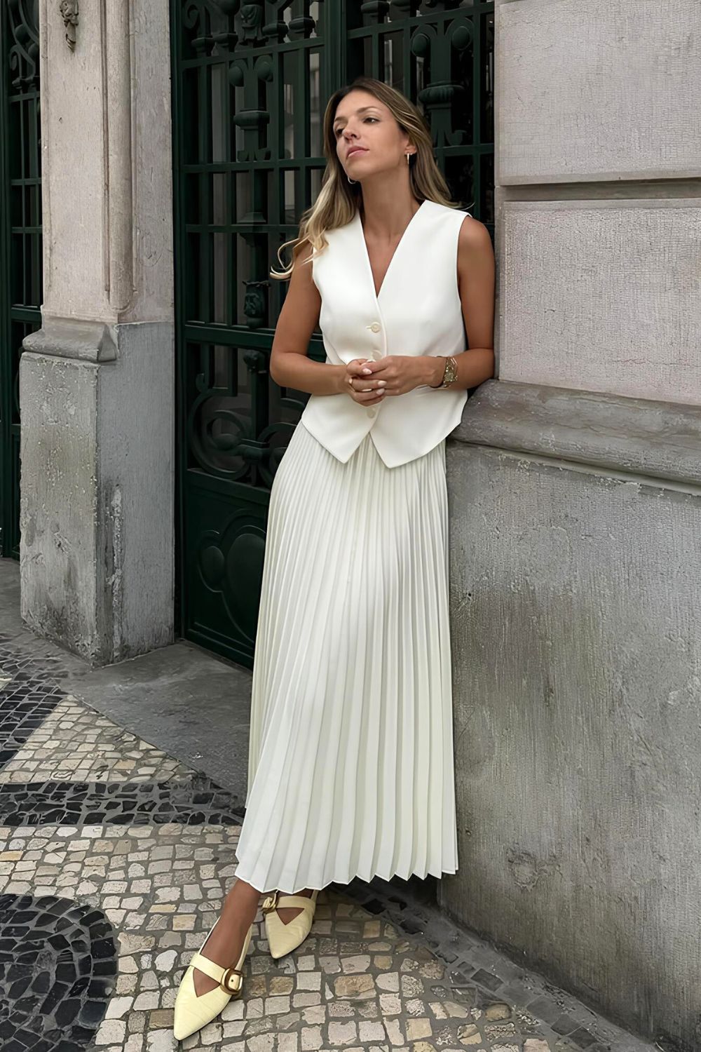 White pleated silk skirt with white vest