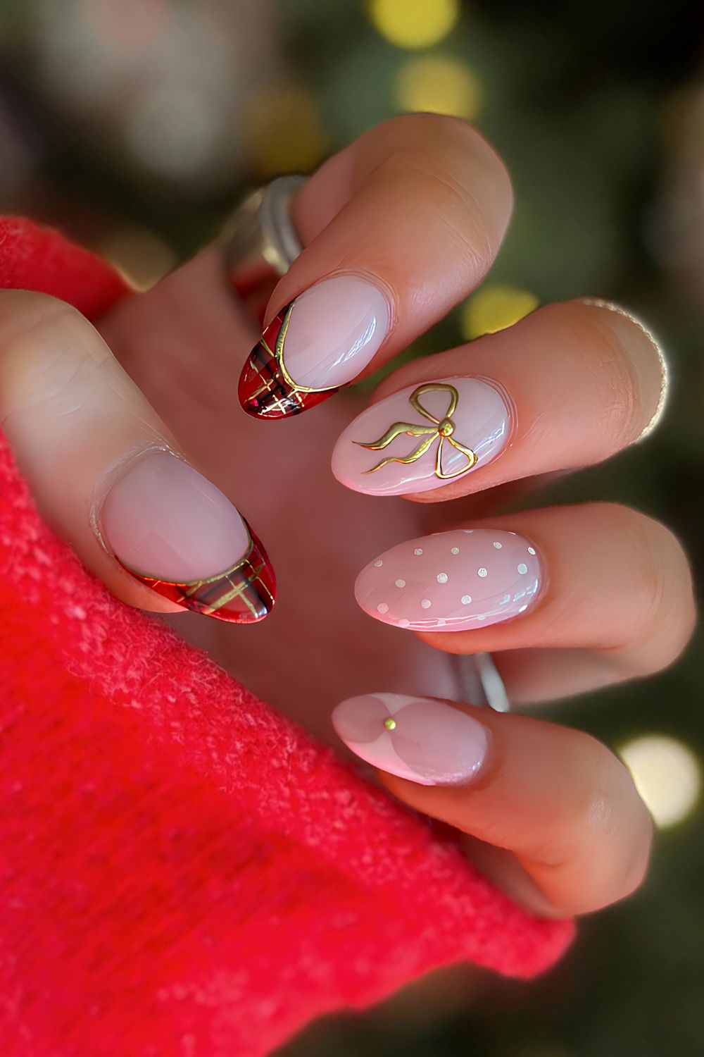 White winter nails with plaid and bow accents