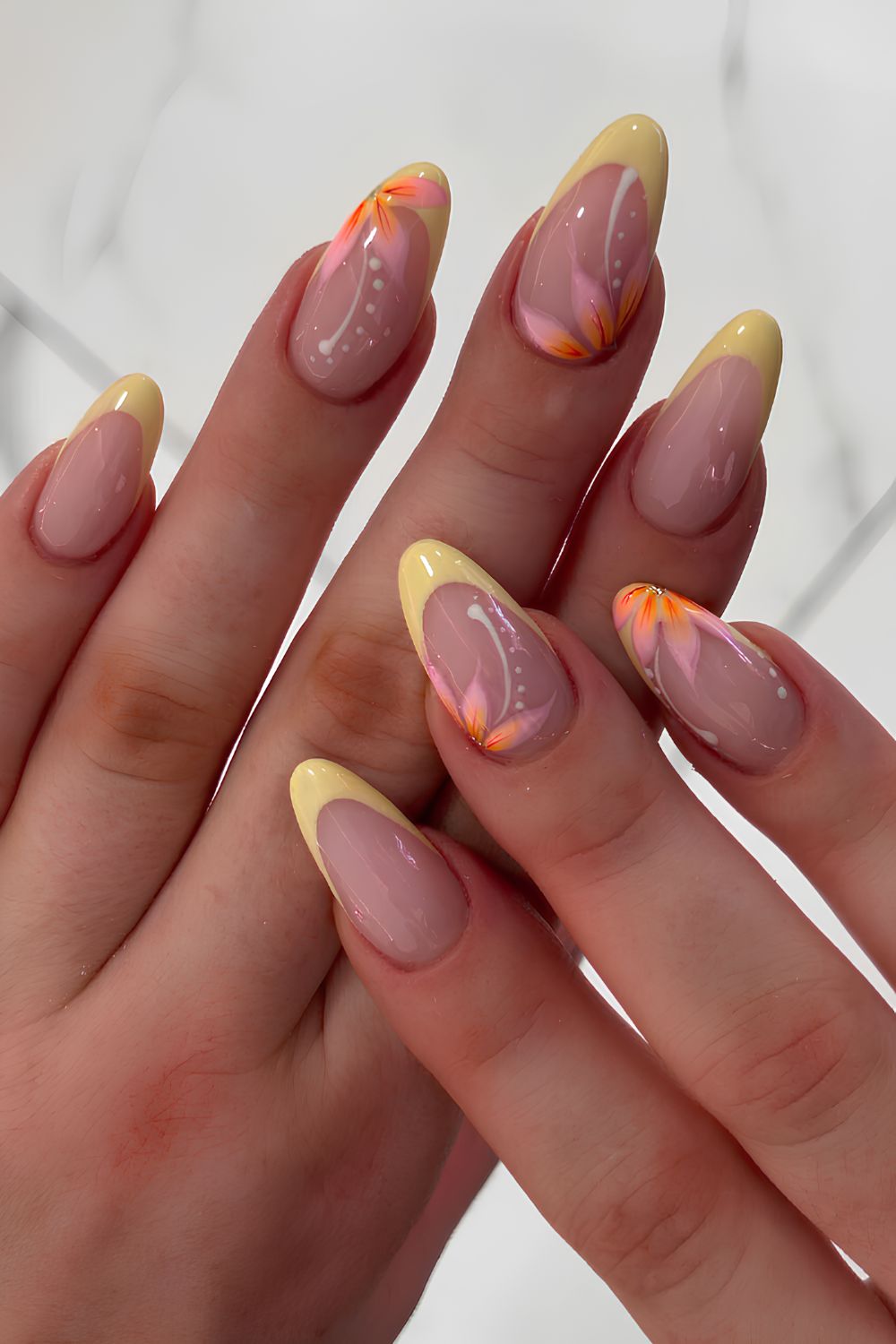 Yellow French mani with hibiscus art