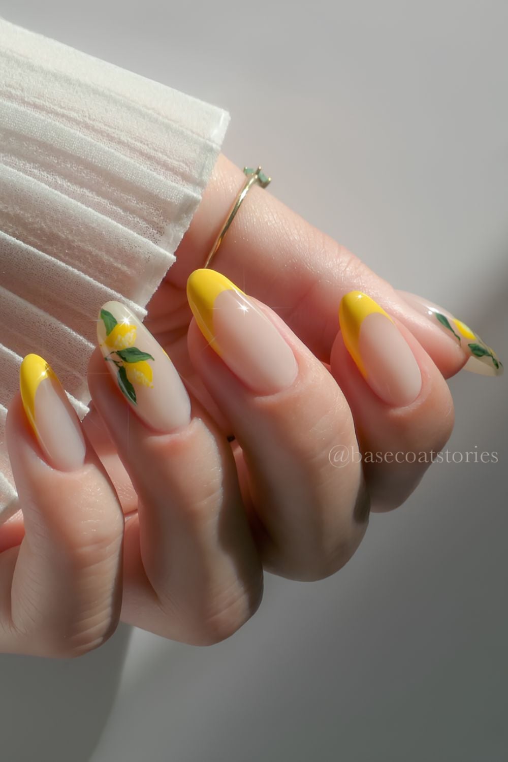 Yellow French manicure with lemon and leaves art