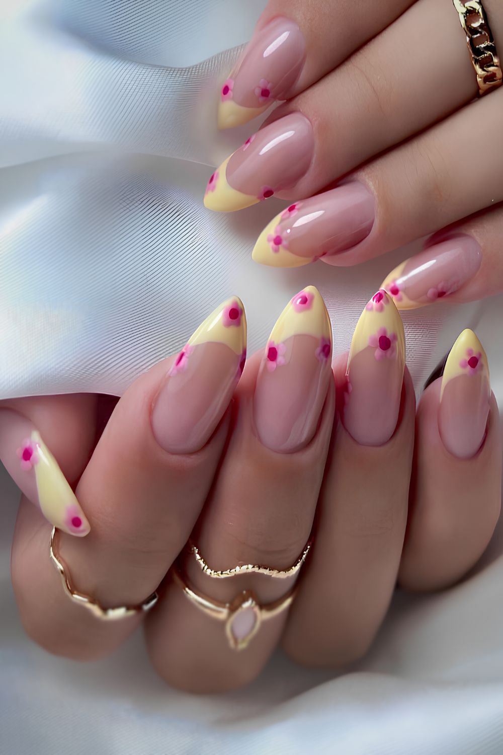 Yellow French nails with cherry blossoms