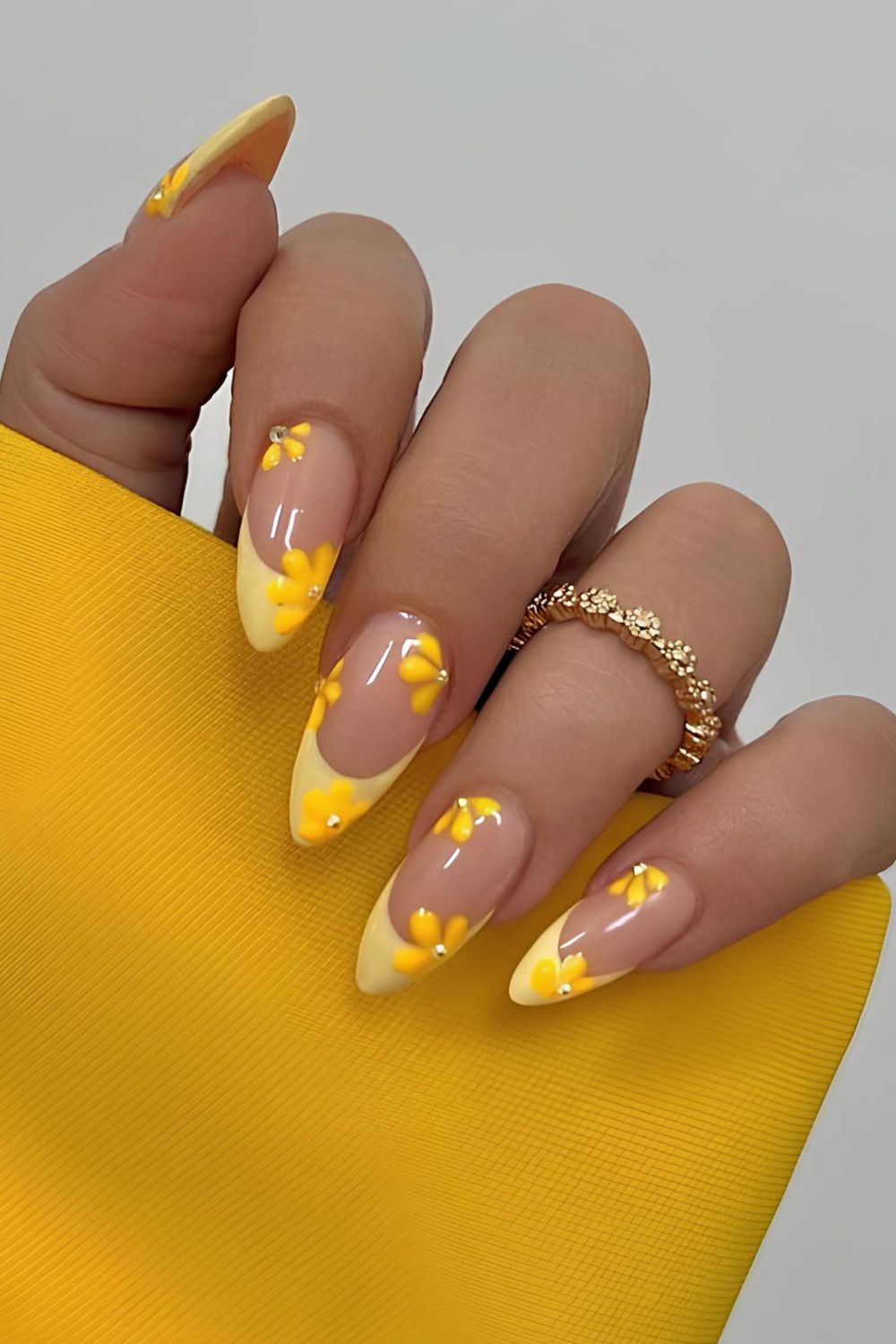 Yellow French nails with flowers