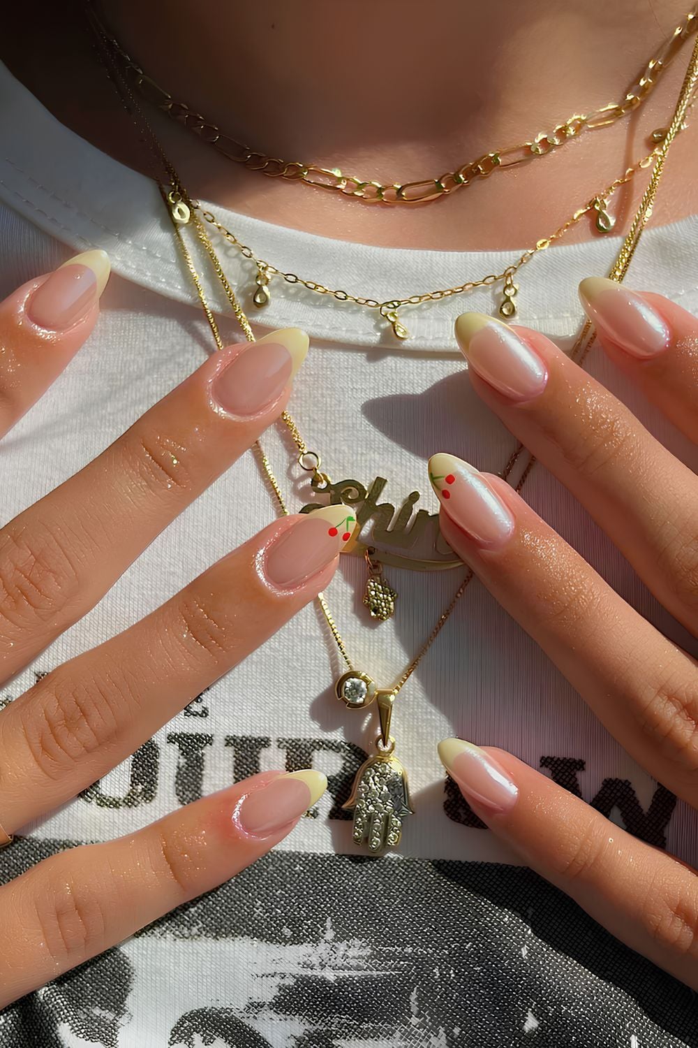 Yellow chrome French mani with cherry art