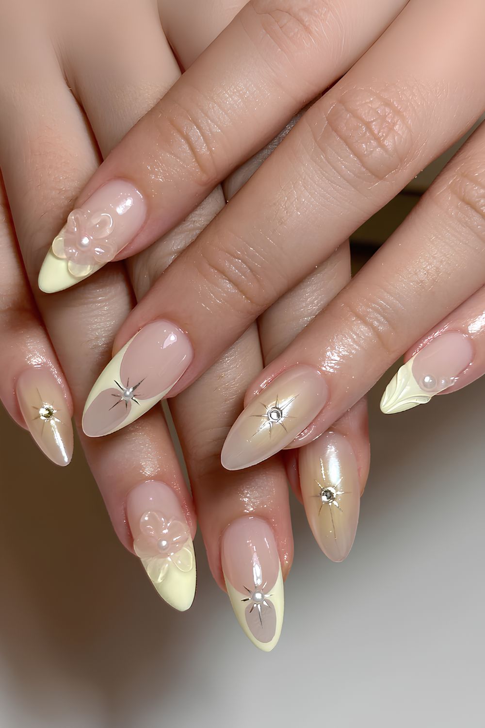 Yellow mix and match nails with flowers and pearls