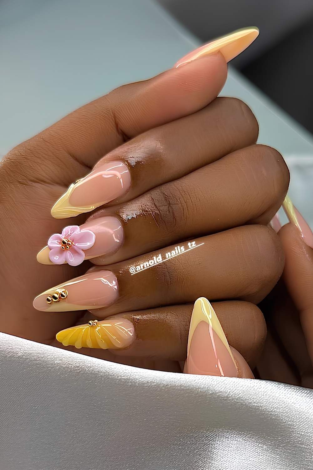 Yellow nails with textured pink florals