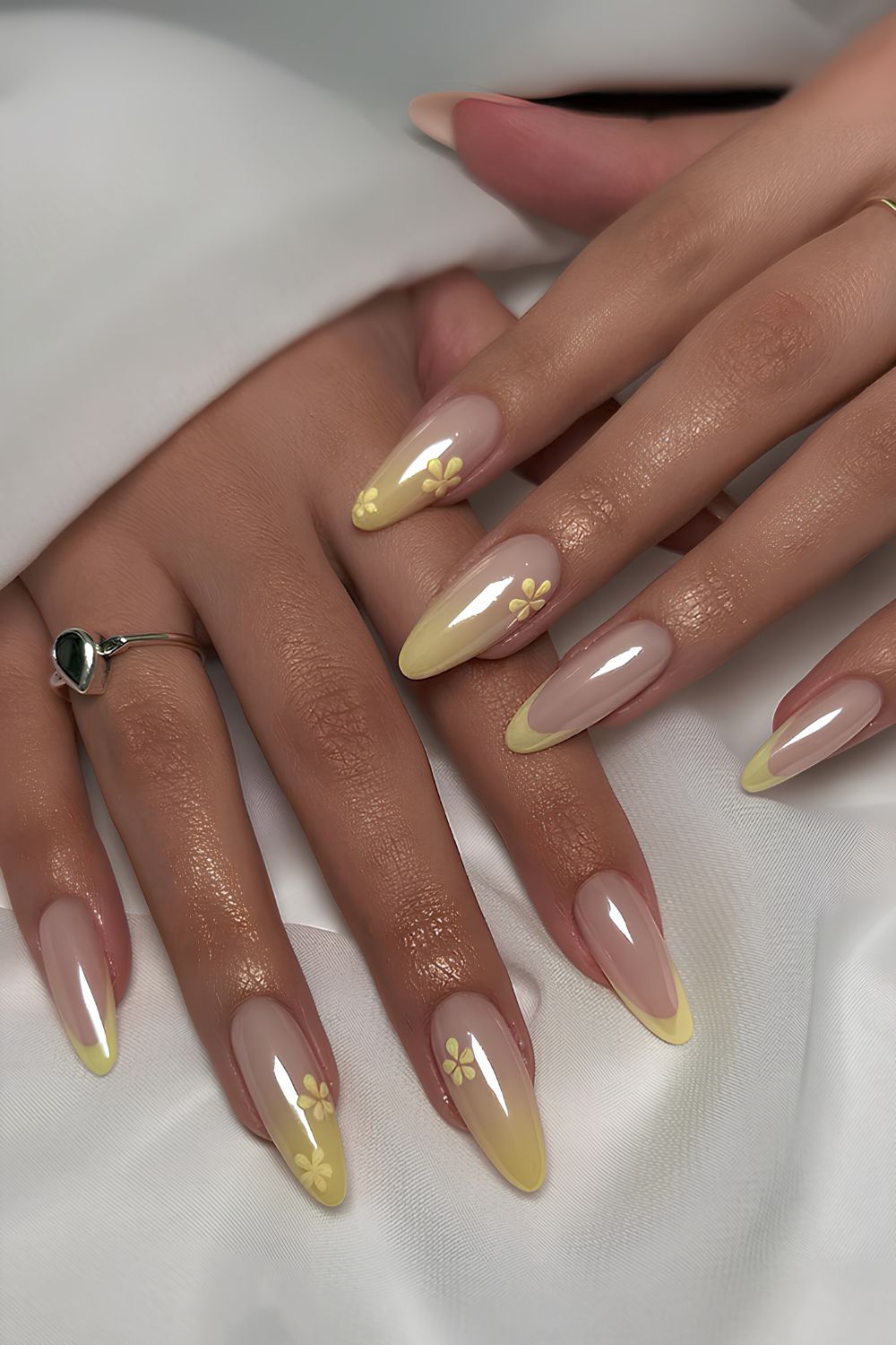 Yellow ombre nails with flowers